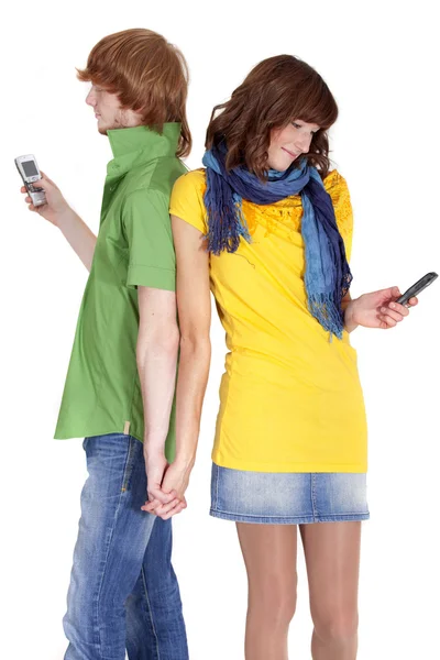 Couple with phones — Stock Photo, Image