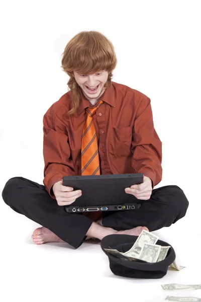 Poor businessman with laptop — Stock Photo, Image
