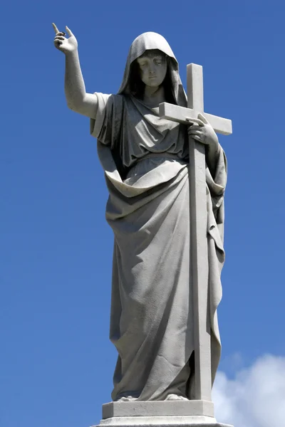 Marble statue with cross — Stock Photo, Image