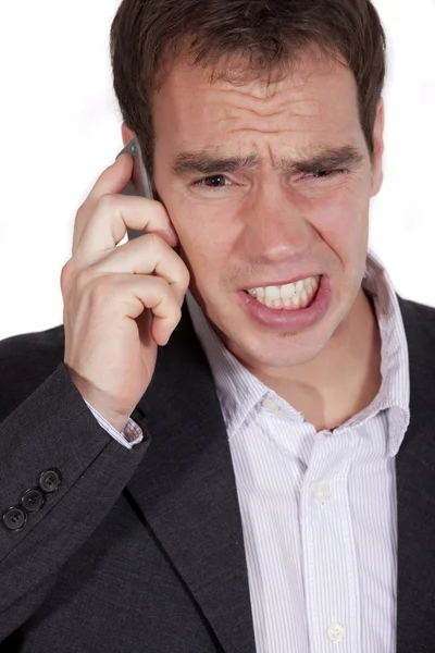 Homem chocado ao telefone — Fotografia de Stock