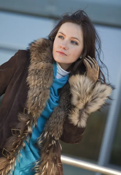 Happy woman in fur coat — Stock Photo, Image