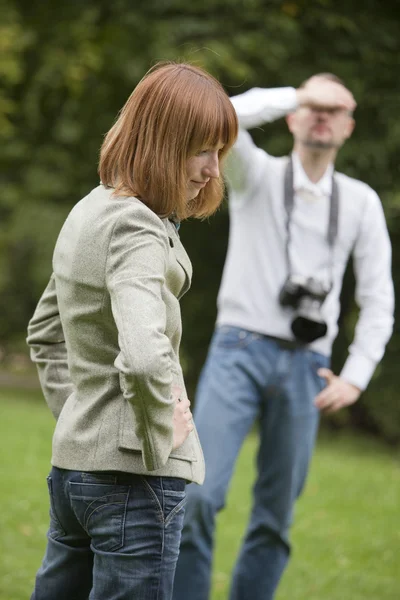 Unhappy photographer and model — Stock Photo, Image