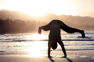 Man trying cartwheel clipart