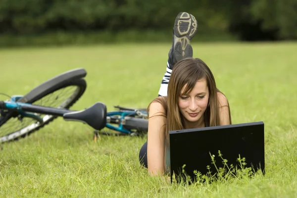 Working with laptop outdoor — Stock Photo, Image