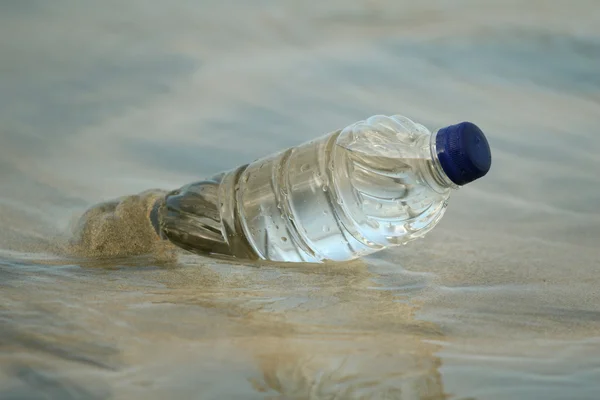 stock image Bottle in water