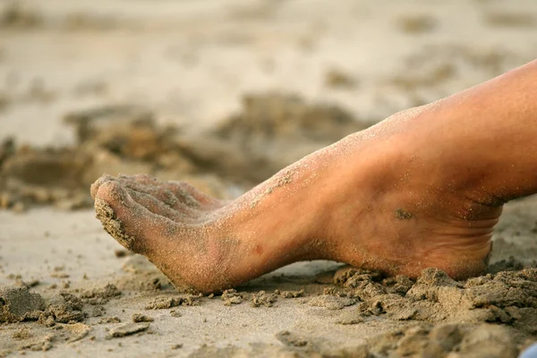 Pie en la arena — Foto de Stock
