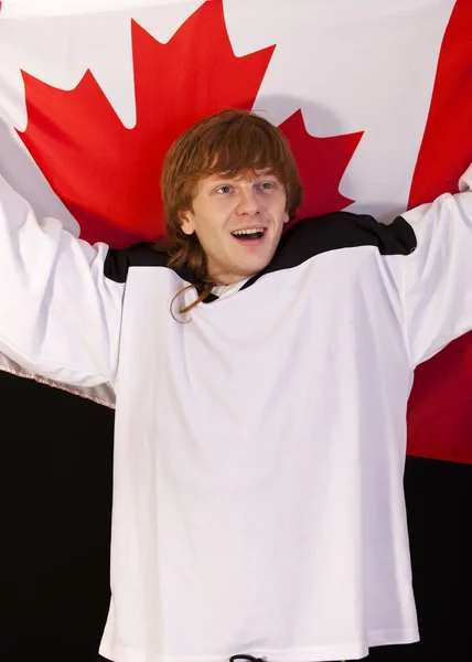 Tifoso di hockey con bandiera canadese — Foto Stock