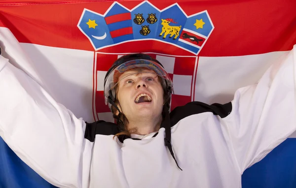 Ijshockeyspeler met Kroatische vlag — Stockfoto