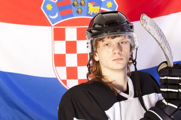 Jugador de hockey sobre hielo sobre bandera croata — Foto de Stock