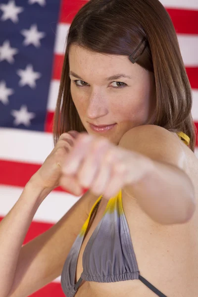 Fighting woman over american flag — Stock Photo, Image