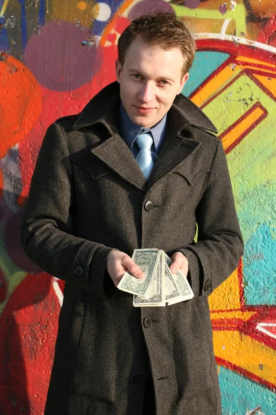 Человек с деньгами — стоковое фото