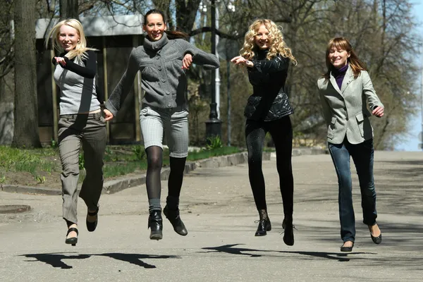 Group of girls jumping — Stock Photo, Image