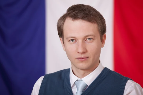 Політик над прапором франції — стокове фото