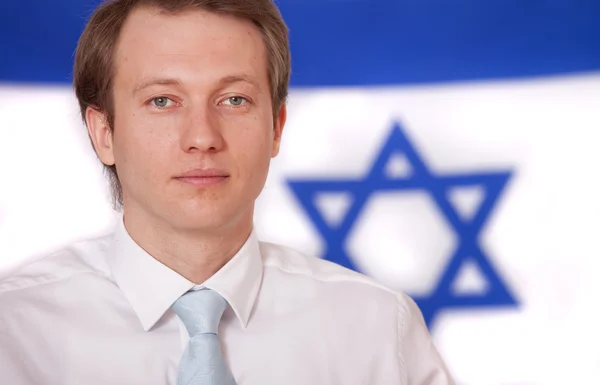 Uomo d'affari sulla bandiera israeliana — Foto Stock