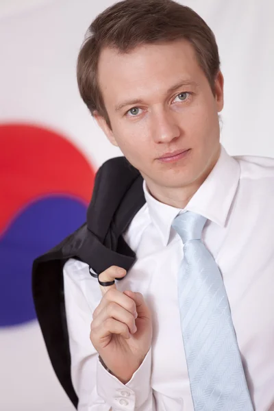 Homem com casaco sobre bandeira da Coreia do Sul — Fotografia de Stock