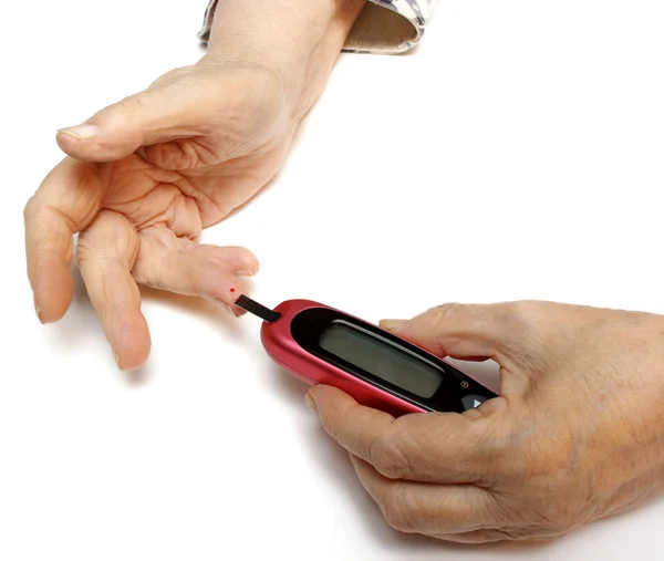 Auto-monitorização dos níveis de glucose no sangue — Fotografia de Stock