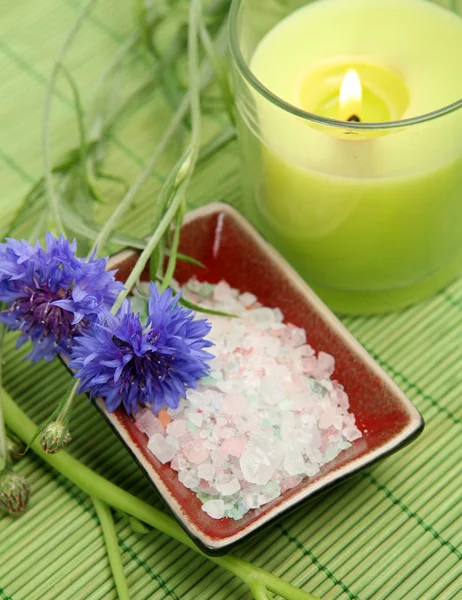 Green candle and salt — Stock Photo, Image