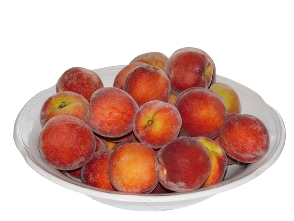 Ripe peaches in plate — Stock Photo, Image