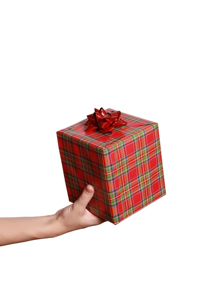 Hand mit Geschenk auf weißem Hintergrund — Stockfoto