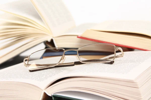 Spectacles on book — Stock Photo, Image