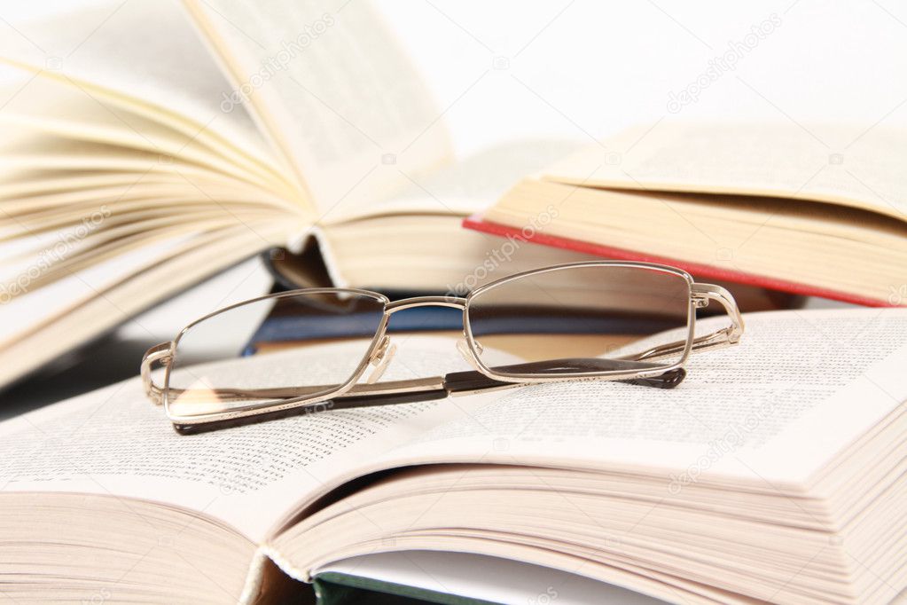 Spectacles on book