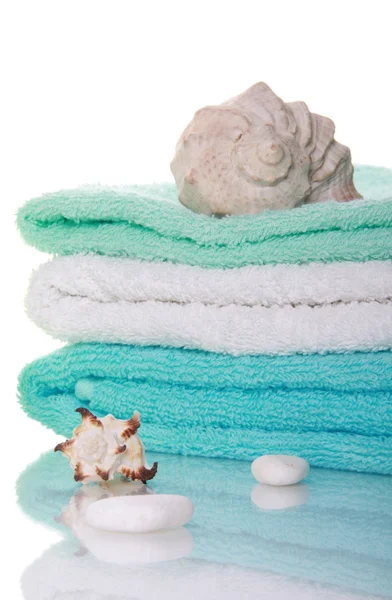 Conchiglie e asciugamani — Foto Stock