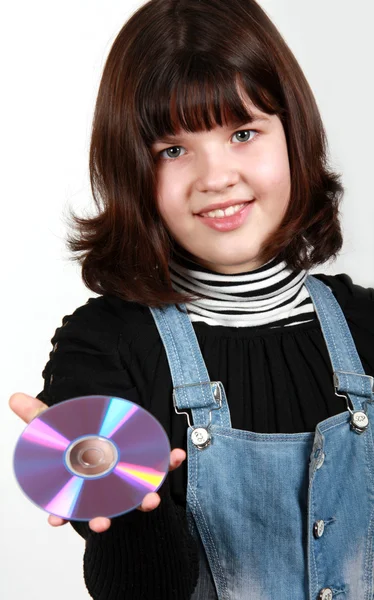 Девочка с CD-диском — стоковое фото