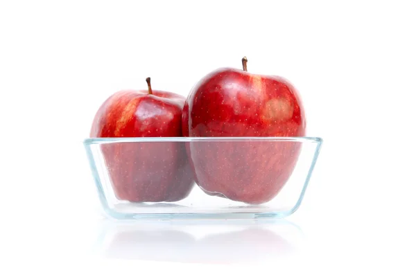 Apples in glass bow — Stock Photo, Image