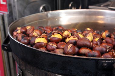 Roasted colorful chestnuts clipart
