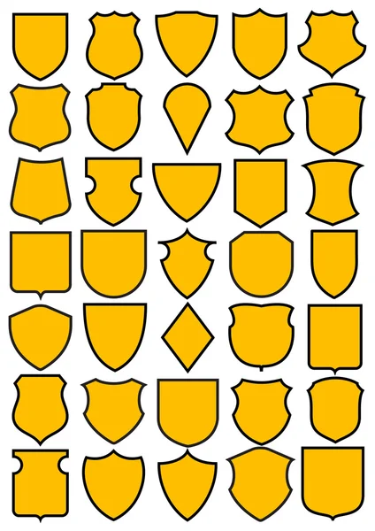 Set of different heraldic shields — Stock Vector