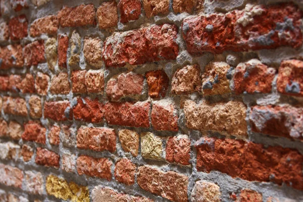 Antigua textura de ladrillos rojos agrietados — Foto de Stock