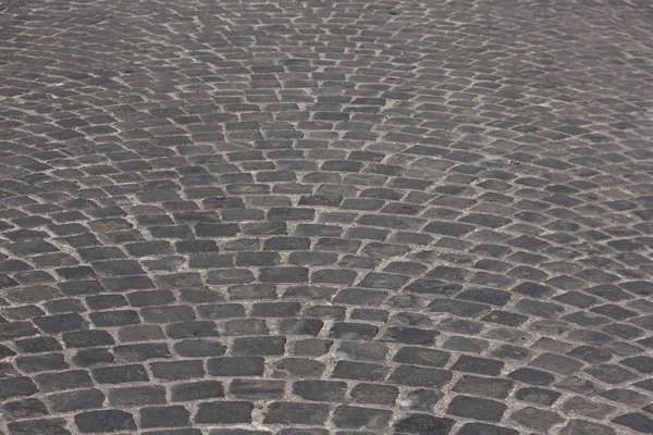 Gamla medeltida granit kullersten vägen — Stockfoto