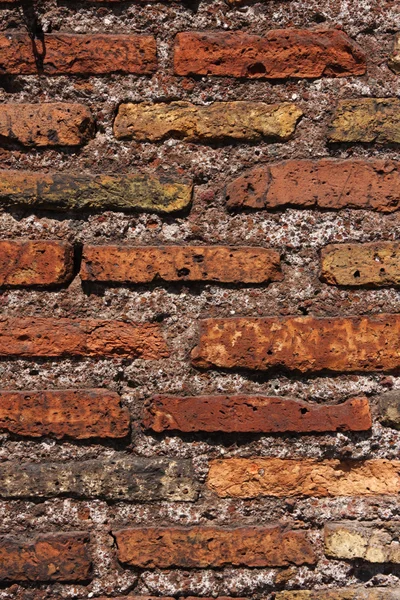 Velho rachado tijolos vermelhos textura — Fotografia de Stock
