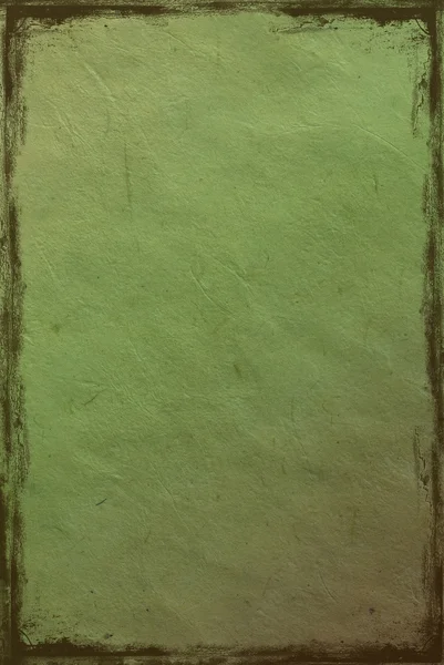 Tło zielony zgnieciony papier — Zdjęcie stockowe