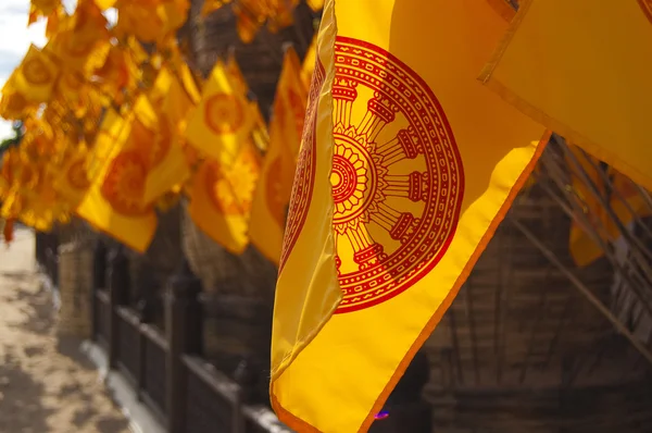 stock image Yellow flags near Asian Wat