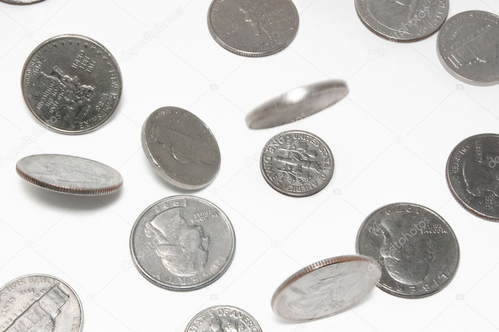 Falling US coins on isolated background