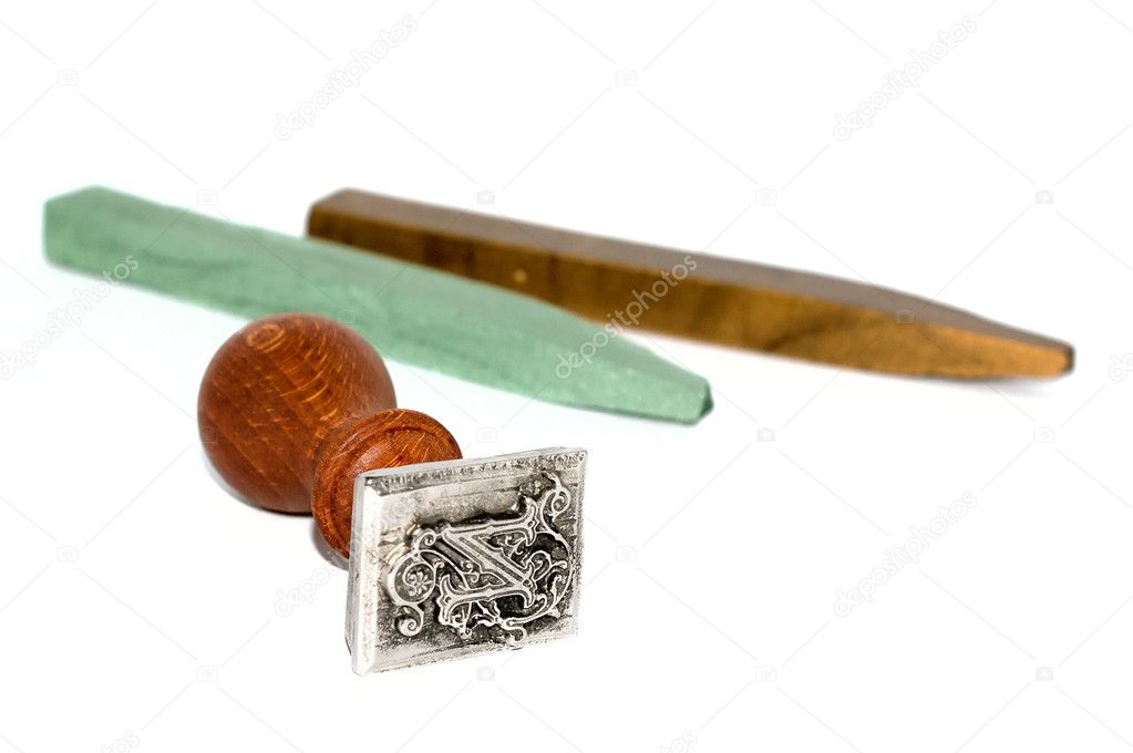 Stamp and sealing wax on white backgroun