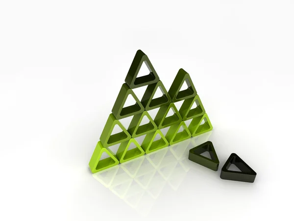 Trasiga grönt pyramid — Stockfoto