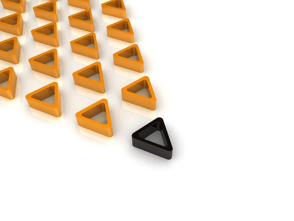 Triângulo preto e muitas laranja — Fotografia de Stock
