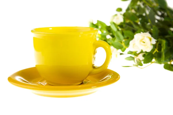 Cup and flowers — Stock Photo, Image
