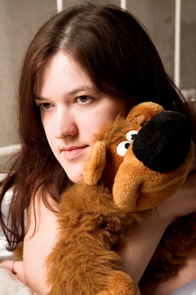 Girl with soft toy — Stock Photo, Image