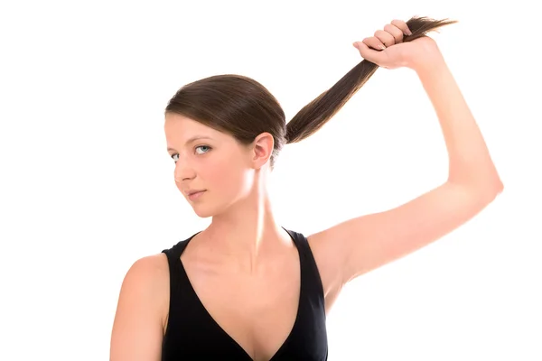 Дівчина тримає волосся — стокове фото
