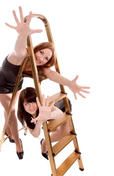 Girls with stepladder — Stock Photo, Image