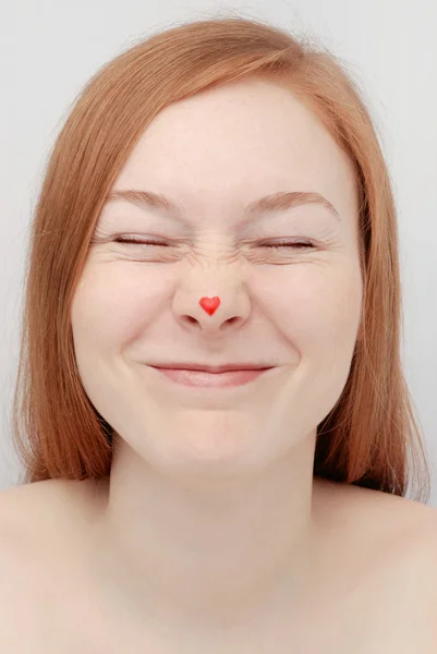 Young woman with heart — Stock Photo, Image