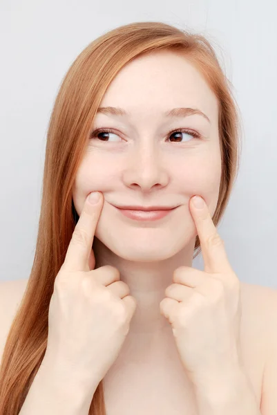 Young woman smilling — Stock Photo, Image