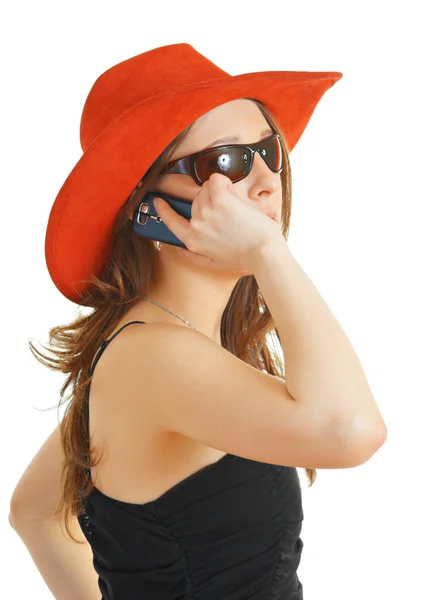 Girl in a red hat and sun glasses — Stock Photo, Image
