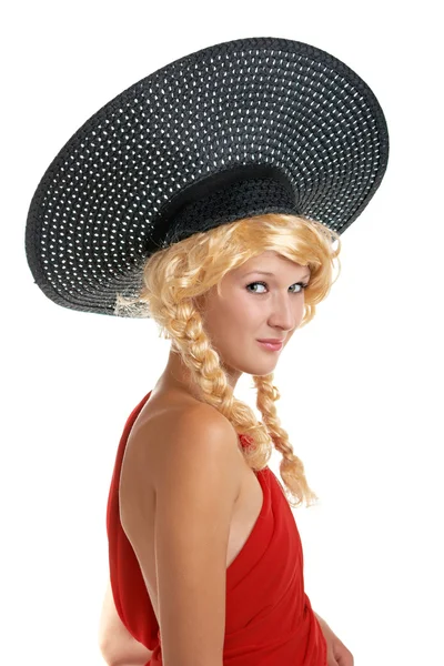 Chica en un sombrero negro — Foto de Stock