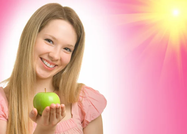 Girl with apple on pink — Stock Photo, Image
