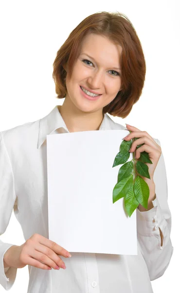 Menina com uma folha de papel e folhas — Fotografia de Stock