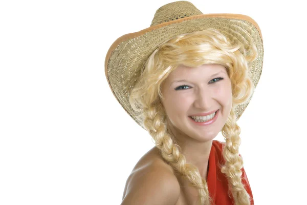 Jong meisje in een stro westerse hoed — Stockfoto
